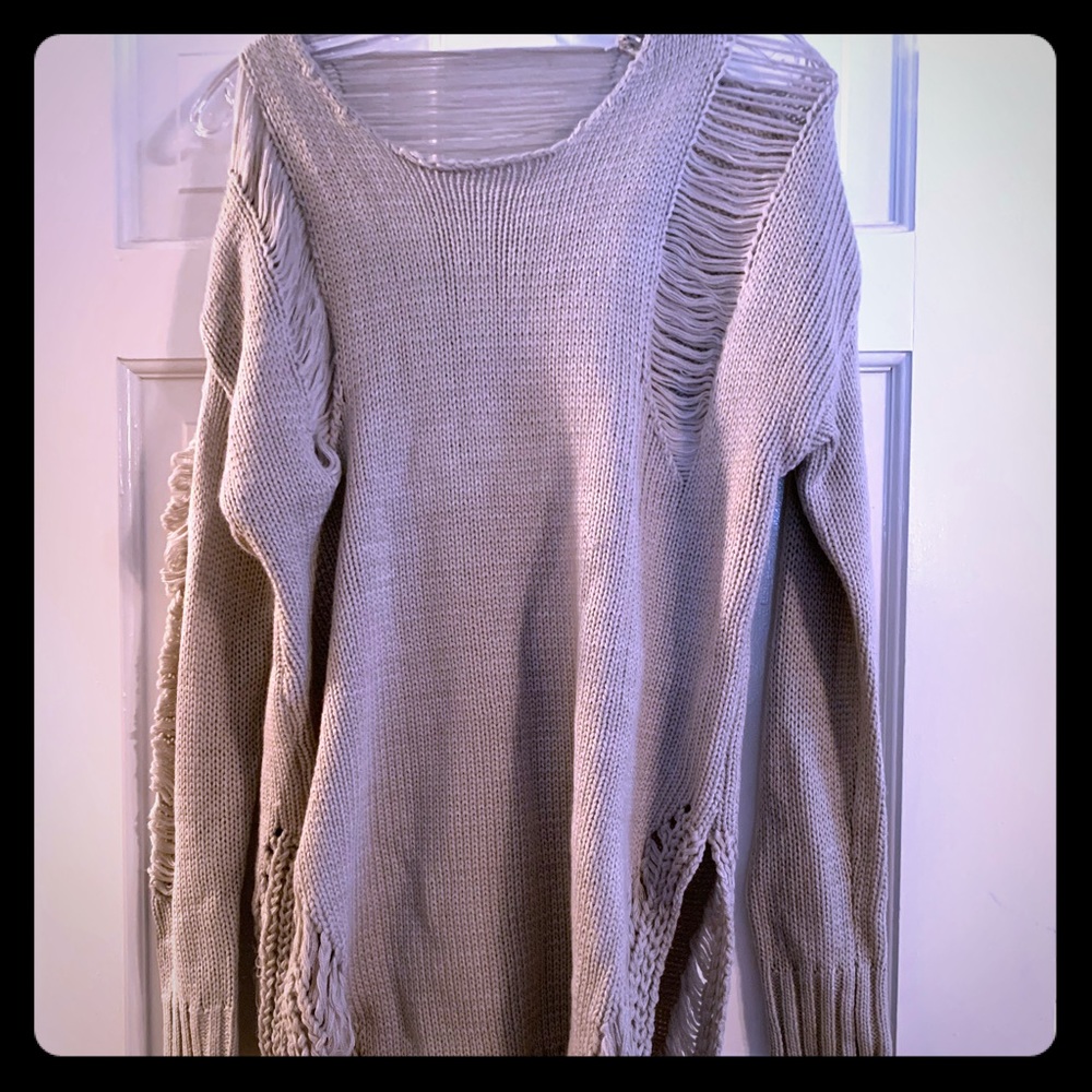 Chic distressed sweater